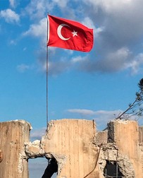 epa06484209 A handout photo made available by the Turkish Armed Forces General Staff shows Turkish flag which is unfurl by Turkish soldiers waves on the mountain of Burseya, in the north of Afrin, Syria, 28 January 2018 (Issued 29 January 2018). The Turkish army is on an operation 'named 'Operation Olive Branch' in Syria's northern regions against the Kurdish Popular Protection Units (YPG) forces which control the city of Afrin. Turkey classifies the YPG as a terrorist organization. EPA-EFE/TURKISH ARMED FORCES GENERAL STAFF HANDOUT HANDOUT HANDOUT EDITORIAL USE ONLY/NO SALES