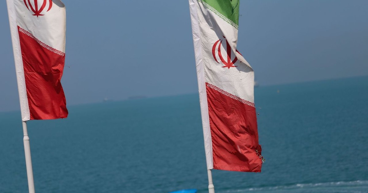 April 28, 2024, Bushehr, Iran: A boat is sailing as Iranian flags wave on the northern coast of the Persian Gulf in the seaport city of Bushehr, Bushehr Province, southern Iran. The Persian Gulf is a Mediterranean Sea in West Asia. It is an extension of the Indian Ocean located between Iran and the Arabian Peninsula. The Strait of Hormuz connects it to the Gulf of Oman in the east. The Shatt al-Arab River delta forms the northwest shoreline. (Credit Image: © Rouzbeh Fouladi/ZUMA Press Wire)