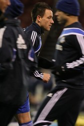 epa02011778 Chelsea and England captain John Terry warms-up before their English Premiership league soccer match against Burnley at the Turf Moor stadium in Burnley, north west Britain 30 January 2010. Terry lost a High Court order earlier in the week banning the media from reporting revelations Terry had an affair with Manchester City's Wayne Bridge's then partner French woman Vanessa Perroncel while the pair both played for Chelsea. EPA/LINDSEY PARNABY NO ONLINE OR INTERNET USE WITHOUT A LICENSE FROM THE FOOTBALL DATA CO. LTD.