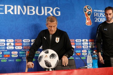 epa06807113 Uruguay's head coach Oscar Tabarez (L) and Urugay's player Diego Godin attend a press conference at the Ekaterinburg Arena in Ekaterinburg, Russia, 14 June 2018. Uruguay will face Egypt in the FIFA World Cup 2018 Group A preliminary round soccer match on 15 June 2018. (RESTRICTIONS APPLY: Editorial Use Only, not used in association with any commercial entity - Images must not be used in any form of alert service or push service of any kind including via mobile alert services, downloads to mobile devices or MMS messaging - Images must appear as still images and must not emulate match action video footage - No alteration is made to, and no text or image is superimposed over, any published image which: (a) intentionally obscures or removes a sponsor identification image; or (b) adds or overlays the commercial identification of any third party which is not officially associated with the FIFA World Cup) EPA-EFE/ATEF SAFADI EDITORIAL USE ONLY EPA-EFE/ATEF SAFADI EDITORIAL USE ONLY EDITORIAL USE ONLY