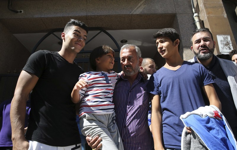Osama Abdul Mohsen și fiul său, Zaid, au ajuns la Getafe