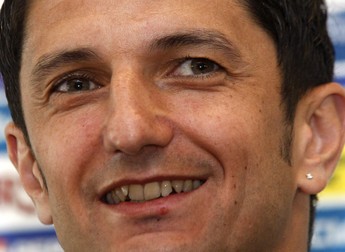 Romanian first division team coach of FC Brasov, Razvan Lucescu, smiles while briefing the media during his first press conference at Romanian Soccer Association (FRF) headquarters in Bucharest, Romania, 30 April 2009. Lucescu was hired as the new coach of Romania's national football team on 29 April 2009 with the task of bringing the team back to major international tournaments. Lucescu, 40, replaces Victor Piturca, who was fired earlier this month with Romania next to last in its qualifying group for the 2010 World Cup. EPA/ROBERT GHEMENT
