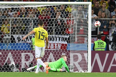 epa06862506 Mateus Uribe of Colombia misses a penalty during the penalty shootout during the FIFA World Cup 2018 round of 16 soccer match between Colombia and England in Moscow, Russia, 03 July 2018. (RESTRICTIONS APPLY: Editorial Use Only, not used in association with any commercial entity - Images must not be used in any form of alert service or push service of any kind including via mobile alert services, downloads to mobile devices or MMS messaging - Images must appear as still images and must not emulate match action video footage - No alteration is made to, and no text or image is superimposed over, any published image which: (a) intentionally obscures or removes a sponsor identification image; or (b) adds or overlays the commercial identification of any third party which is not officially associated with the FIFA World Cup) EPA-EFE/FACUNDO ARRIZABALAGA EDITORIAL USE ONLY