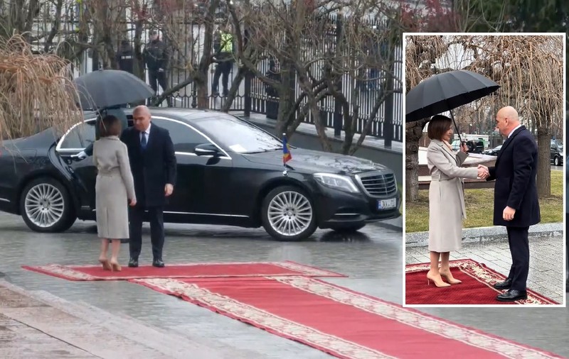 Gestul de mare cavaler făcut în ploaie de Ilie Bolojan, imediat după ce s-a întâlnit cu Maia Sandu, la Chișinău