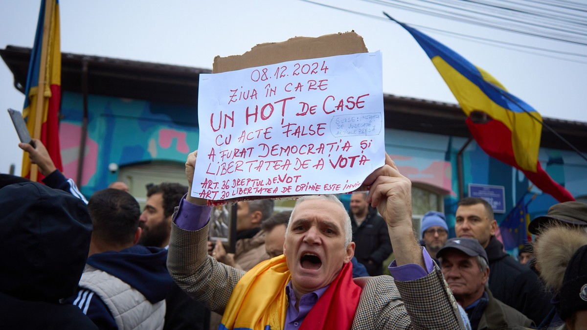 A supporter of the far-right ultranationalist runoff candidate for the presidency of Romania, Calin Georgescu, shouts as Georgescu (not in picture) speaks to the press at a closed polling station for the second round of the presidential electionelection that was supposed to take place today. Due to irregularities in Georgescu's campaign, the Constitutional Court of Romania (CCR) decided to annul the entire presidential electoral process, invoking Article 146(f) of the Constitution. The electoral process for electing the President of Romania will be restarted from scratch, with the government tasked with setting a new date. Calin Georgescu, presidential elections in Romania legally cancelled, Bucharest, Ilfov, Romania - 08 Dec 2024