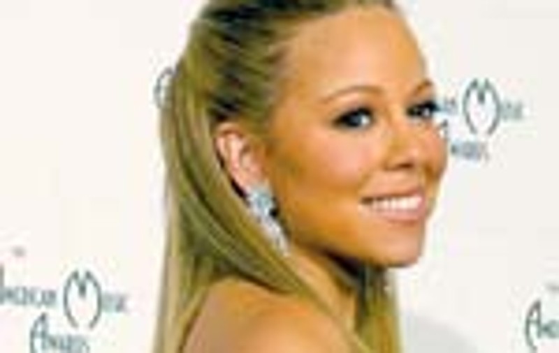 Mariah Carey merge la baie cu bodyguarzi