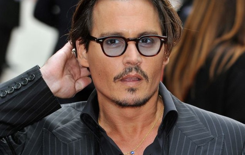 Johnny Depp vrea să-l ajute pe Nicolas Cage să-şi plătească datoriile