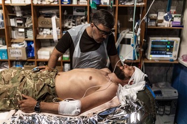 DONETSK OBLAST, UKRAINE - MAY 29: A Ukrainian soldier receives treatment from army medics at a stabilization point as the war between Russia and Ukraine continues in the direction of Chasiv Yar, Donetsk Oblast, Ukraine onMay 29, 2024. Diego Herrera Carcedo / Anadolu/ABACAPRESS.COM