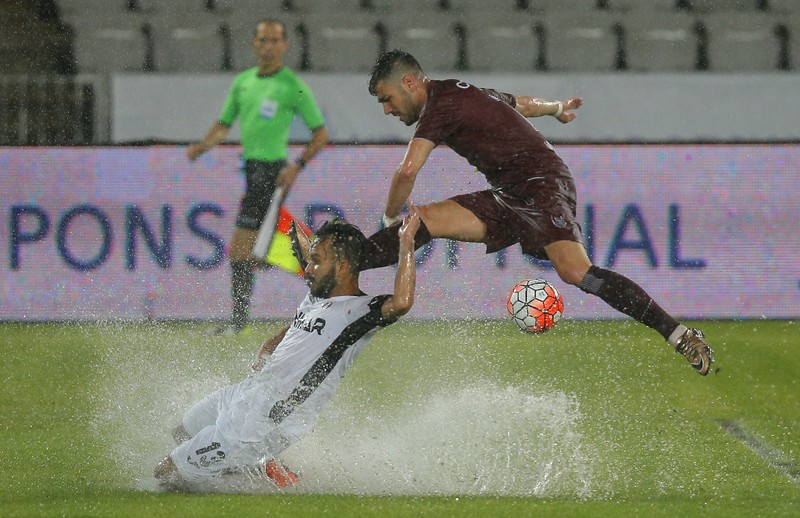 epa05428665 Astra Giurgiu's Morais Junior (down) vies for the ball against CFR Cluj's Cristian Lopez (R) during their final match of Romania's Supercup 2016 at Cluj Arena Stadium in Cluj Napoca, Romania, 16 July 2016. EPA/ROBERT GHEMENT