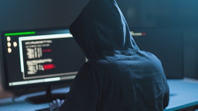 hacker using computer virus for cyber attack