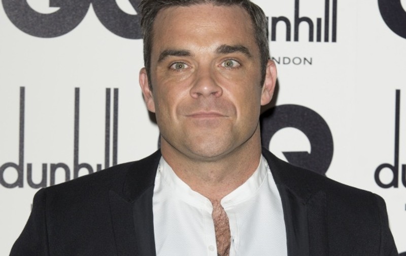 Robbie Williams le înnebuneşte pe femei! GESTUL IMPRESIONANT al solistului