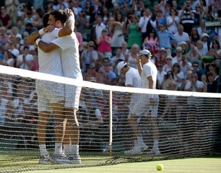 epa04842871 (L-R) Jean-Julien Rojer of the Netherlands and Horia Tecau of Romania celebrate winning the Men's doubles final match against John Peers of Australia and Jamie Murray of Britain during the Wimbledon Championships at the All England Lawn Tennis Club, in London, Britain, 11 July 2015. EPA/FACUNDO ARRIZABALAGA EDITORIAL USE ONLY/NO COMMERCIAL SALES