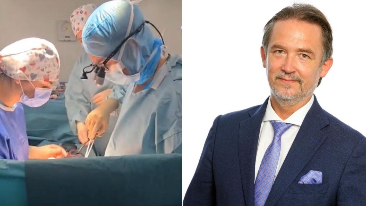 Colaj medici in sala de operație si dr Horațiu Suciu, in sacou inchis la culoare si camasa alba