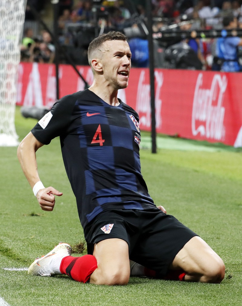 epa06881747 Ivan Perisic of Croatia celebrates after scoring the 1-1 during the FIFA World Cup 2018 semi final soccer match between Croatia and England in Moscow, Russia, 11 July 2018. (RESTRICTIONS APPLY: Editorial Use Only, not used in association with any commercial entity - Images must not be used in any form of alert service or push service of any kind including via mobile alert services, downloads to mobile devices or MMS messaging - Images must appear as still images and must not emulate match action video footage - No alteration is made to, and no text or image is superimposed over, any published image which: (a) intentionally obscures or removes a sponsor identification image; or (b) adds or overlays the commercial identification of any third party which is not officially associated with the FIFA World Cup) EPA-EFE/SERGEI CHIRIKOV EDITORIAL USE ONLY