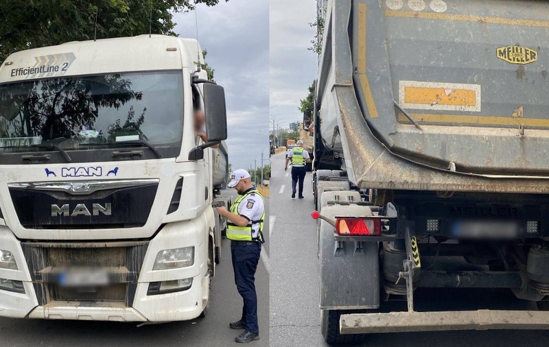 Polițist local care verifică actele unui camion