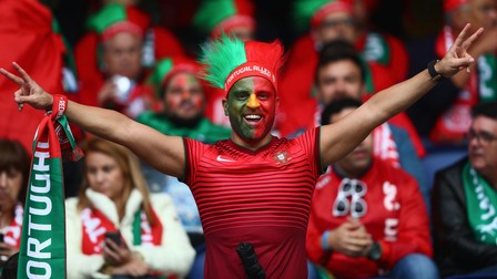 PARIS, FRANCE - JUNE 18: A Portugal fan enjoys the atmosphere prior to the UEFA EURO 2016 Group F match between Portugal and Austria at Parc des Princes on June 18, 2016 in Paris, France. (Photo by Clive Rose/Getty Images)