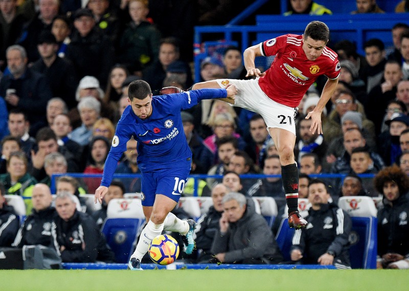 epa06310444 Chelsea Eden Hazard (R) vies for the ball against Manchester United Ander Herrera (R) during English Premier League game between Chelsea and Manchester United at Stamford Bridge stadium in London, Britain, 05 November 2017. EPA-EFE/FACUNDO ARRIZABALAGA EDITORIAL USE ONLY. No use with unauthorized audio, video, data, fixture lists, club/league logos or 'live' services. Online in-match use limited to 75 images, no video emulation. No use in betting, games or single club/league/player publications