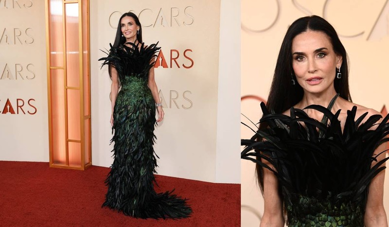 Demi Moore a ajuns la Premiile Oscar din 2026 ca una dintre prezentatoarele serii. Ea a pășit pe covorul roșu într-o rochie Gucci verde, cu pene, dramatică. Foto: Profimedia Images
