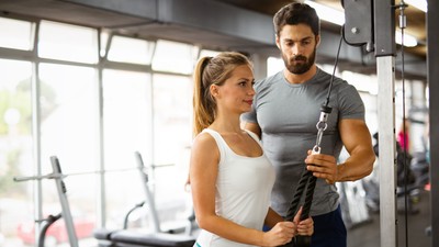 Portrait of happy fit people, friends exercising in gym together. Sport people workout concept