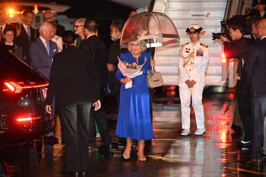 Britain's King Charles III and Queen Camilla are greeted upon their arrival at Sydney International Airport in Sydney on October 18, 2024, for a six-day royal visit to Sydney and Canberra.,Image: 922933763, License: Rights-managed, Restrictions: , Model Release: no
