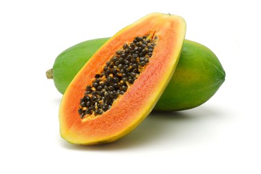 9766486 - half cut and whole papaya fruits on white background