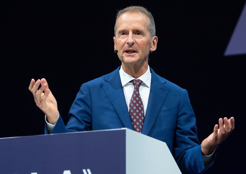 FILED - 07 September 2021, Bavaria, Munich: Herbert Diess, then Chairman of the Board of Management of Volkswagen, speaks on a stage during the International Motor Show Germany (IAA). Photo: Sven Hoppe/dpa