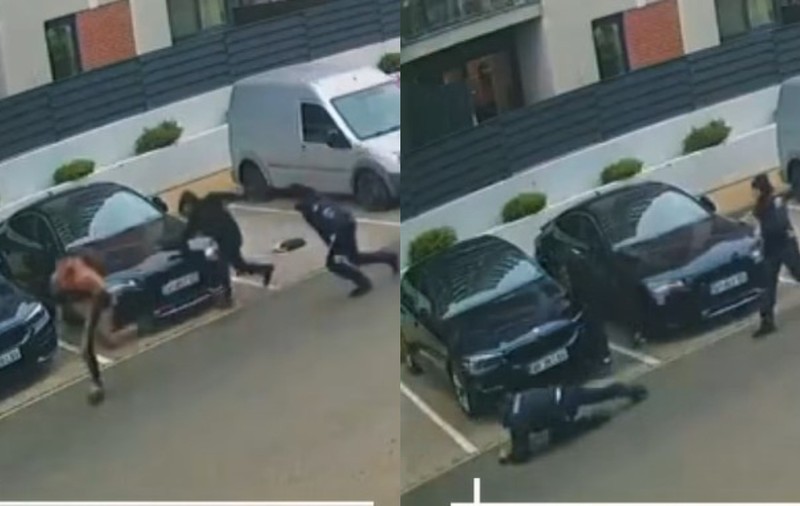 Un polițist s-a împiedicat și a căzut pe asfalt în timp ce alerga un fals colindător, prins când încerca ușile apartamentelor dintr-un bloc din Arad | VIDEO