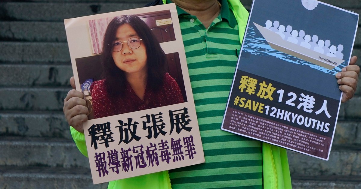 Un activist prodemocrație cere eliberarea lui Zhang Zhan Foto: Profimedia