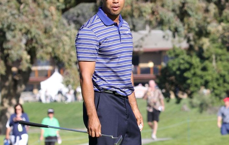 Tiger Woods, amendat pentru că a scuipat în iarbă