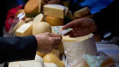Bucharest, Romania - December 16, 2022: Romanian Minister of Agriculture and Rural Development Petre Daea open the food market "Romanian Christmas pro
