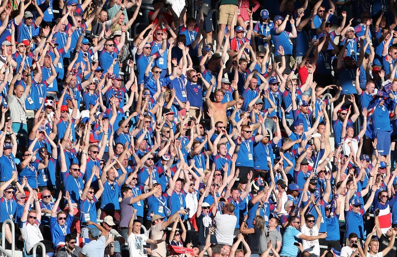 epa06831047 Supporters of Iceland during the FIFA World Cup 2018 group D preliminary round soccer match between Nigeria and Iceland in Volgograd, Russia, 22 June 2018. (RESTRICTIONS APPLY: Editorial Use Only, not used in association with any commercial entity - Images must not be used in any form of alert service or push service of any kind including via mobile alert services, downloads to mobile devices or MMS messaging - Images must appear as still images and must not emulate match action video footage - No alteration is made to, and no text or image is superimposed over, any published image which: (a) intentionally obscures or removes a sponsor identification image; or (b) adds or overlays the commercial identification of any third party which is not officially associated with the FIFA World Cup) EPA-EFE/ZURAB KURTSIKIDZE EDITORIAL USE ONLY