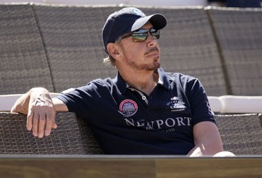 epa06608883 Larry Ellison, co-founder and Executive Chairman of Oracle Corporation and owner of the Indian Wells Tennis Garden watches a match at the BNP Paribas Open at the Indian Wells Tennis Garden in Indian Wells, California, USA, 16 March 2018. EPA-EFE/JOHN G. MABANGLO