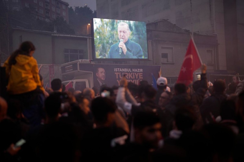 Supporters of the President Recep Tayyip Erdogan celebrate outside AK Party offices in Istanbul, Turkey, Sunday, May 28, 2023. Turkey's incumbent President Recep Tayyip Erdogan has declared victory in his country's runoff election, extending his rule into a third decade.,Image: 779912029, License: Rights-managed, Restrictions: This content is intended for editorial use only. For other uses, additional clearances may be required., Model Release: no, Pictured: Recep Tayyip Erdogan
