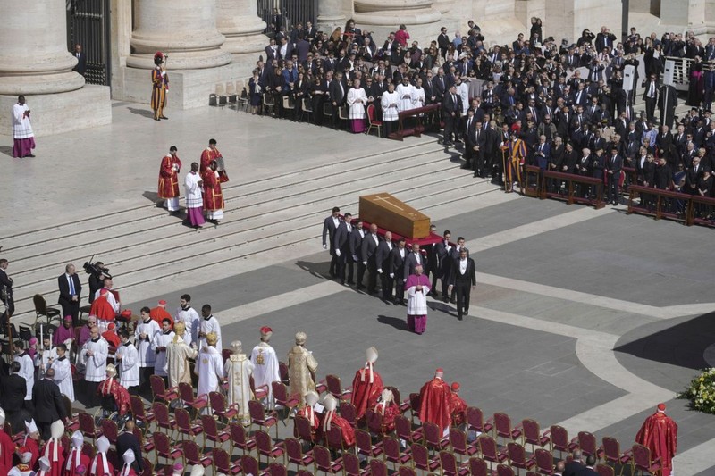 The coffin of Pope Francis arrives during his funeral in St. Peter's Square at the Vatican, Saturday, April 26, 2025. (AP Photo/Markus Schreiber)