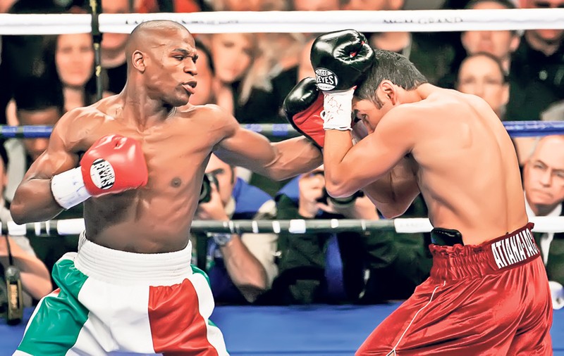Pumn de 40.000.000 de dolari! Floyd Mayweather l-a bătut pe Saul Alvarez şi a unificat titlurile WBC şi WBA la semimijlocie