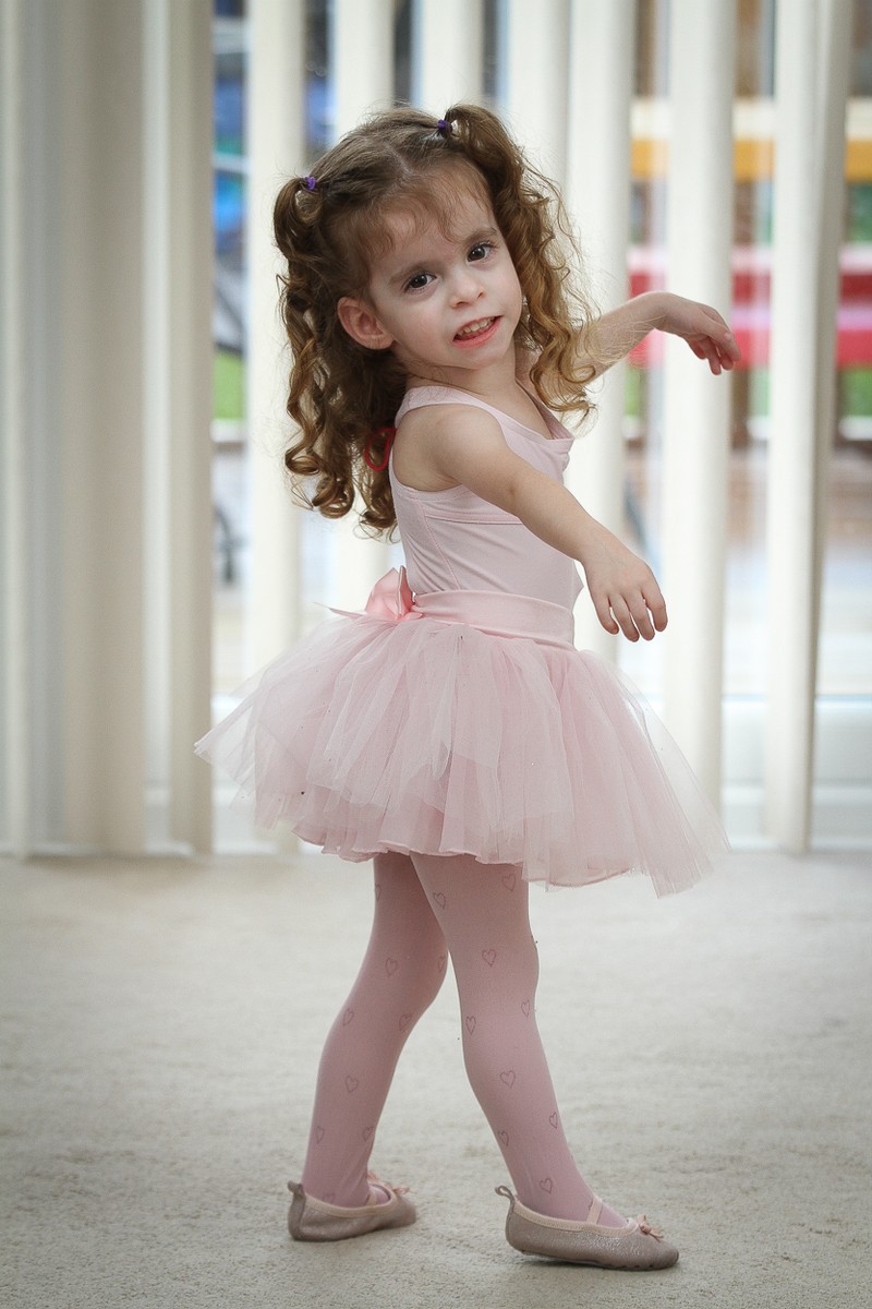 *** UK OUT *** *** EXCLUSIVE *** SANDHURST, UNITED KINGDOM - UNDATED: Three year old Rebecca Lewendon pictured at home in Sandhurst, Berkshire, England. STANDING at only 80 centimetres tall, tiny Rebecca Lewendon could be forgiven for taking a back seat. But the pint sized Thumbelina is determined that her tiny stature wont set her back. Her parents were baffled when she failed to grow when she was born. But she has been diagnosed with a rare growth condition that means at the age of three, she is still only the height of a 12 month old baby. But she is determined to live a normal life - and to join in ballet classes with her sister Kimberley, seven, and brother Ryan, five. PHOTOGRAPH BY Worldwide Features / Barcroft Media UK Office, London. T +44 845 370 2233 W www.barcroftmedia.com USA Office, New York City. T +1 212 796 2458 W www.barcroftusa.com Indian Office, Delhi. T +91 11 4053 2429 W www.barcroftindia.com *** Local Caption *** 02455782