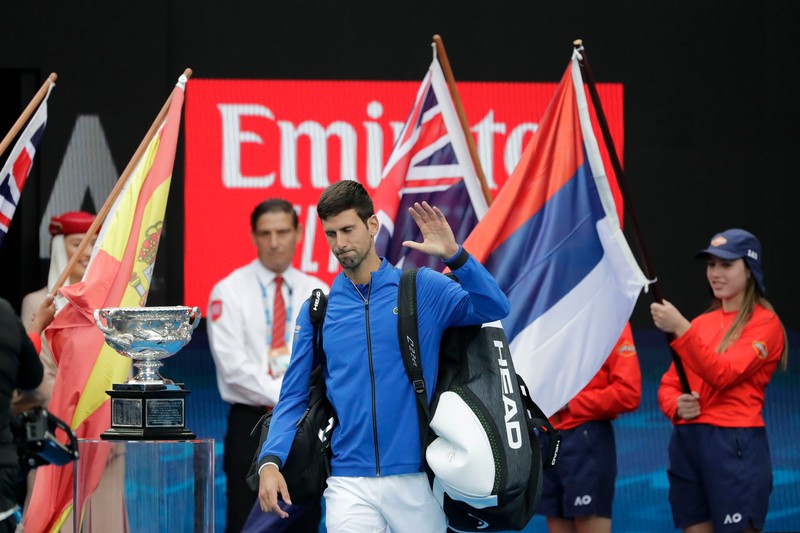 epa07323514 Novak Djokovic of Serbia arrives on court for his men's singles final match against Rafael Nadal of Spain at the Australian Open Grand Slam tennis tournament in Melbourne, Australia, 27 January 2019. EPA-EFE/MAST IRHAM
