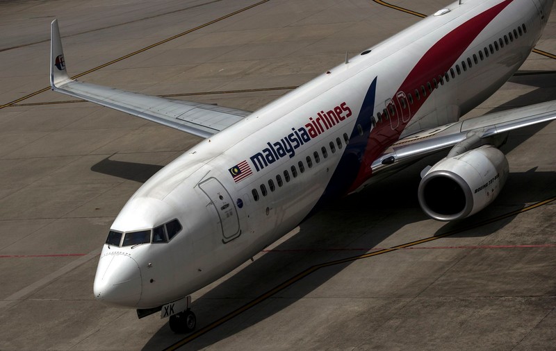 Avionul Malaysia Airlines ar fi fost doborât de armata SUA şi de cea a Thailandei