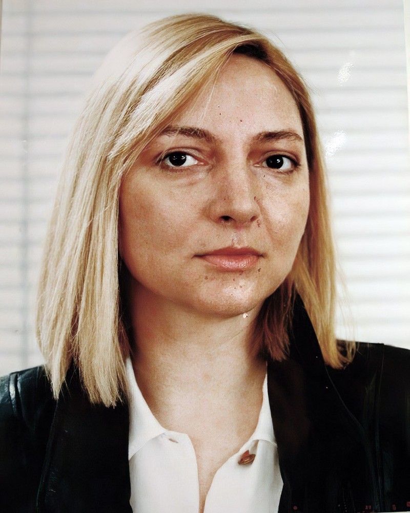 Jurnalista Roxana Dascălu. Fotografie de pe legitimația Reuters