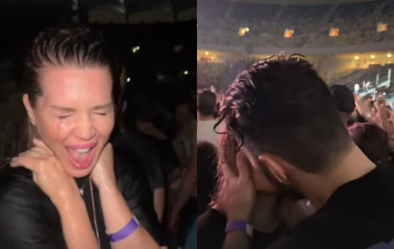Smiley și Gina Pistol, sărut pasional la concertul Depeche Mode. Au sărbătorit ziua cântărețului dansând în ploaie