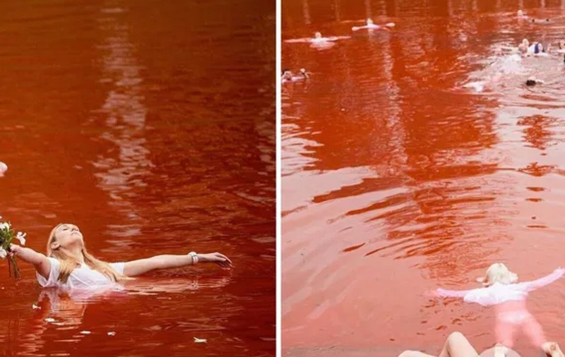 Activiști lituanieni îmbrăcați în alb au făcut baie în „lacul de sânge” din fața Ambasadei Rusiei la Vilnius