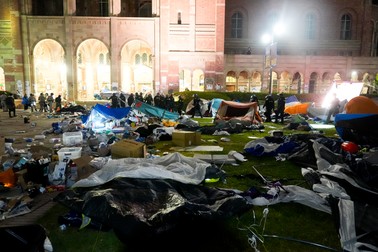 Police break up a pro-Palestinian encampment on the UCLA campus Thursday, May 2, 2024, in Los Angeles. (AP Photo/Jae C. Hong)