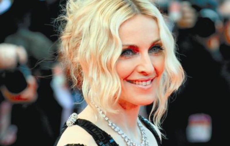 Madonna a adoptat gemene din Malawi. Prima imagine cu fetițele