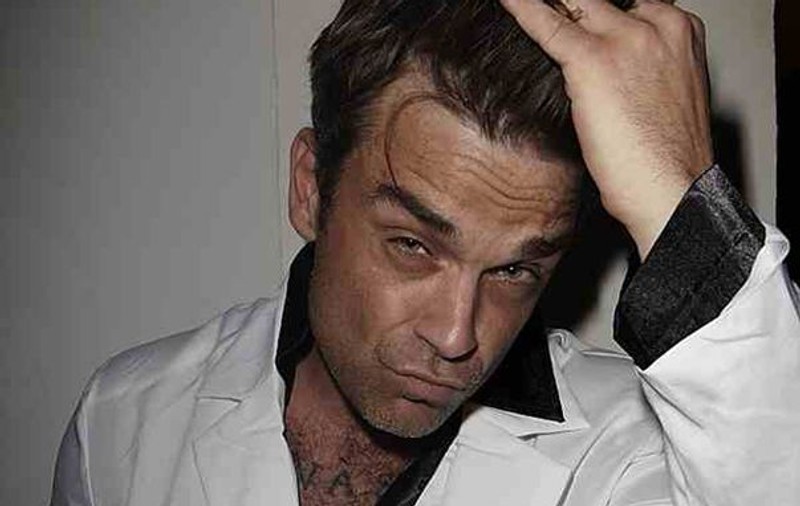 Robbie Williams a ajuns la spital după ce a sărit de pe acoperișul studioului de înregistrări