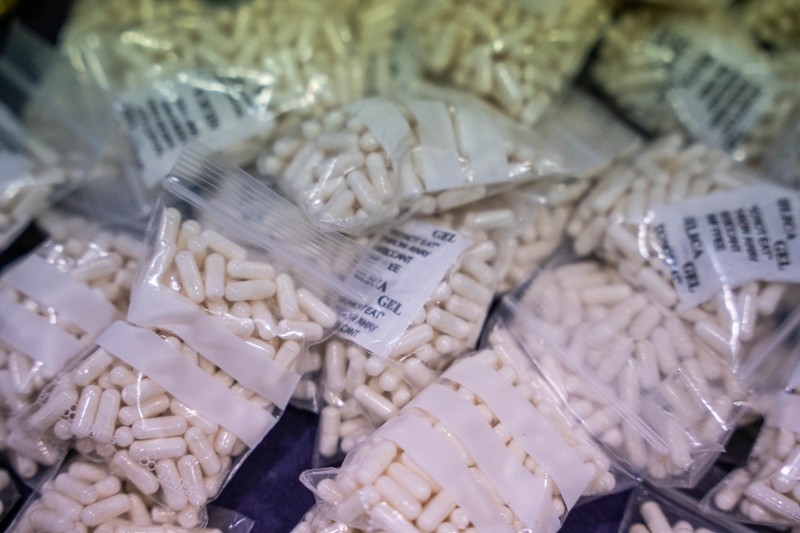 Drug pills seized during the operation 'Butterfly' of the National Police that has dismantled the synthetic drug warehouses in the northern axis of Spain, in the Police Complex of Canillas, on June 21, 2023, in Madrid (Spain). During this police operation, 150,000 ecstasy pills, 135 kilograms of speed, 25 kilos of ketamine, four kilos of pink cocaine, 900 vials of anabolic agents and more than 10,000 liters of precursors have been seized in eleven searches carried out in the provinces of Barcelona, Burgos, Cantabria and Madrid. Thirteen people have been arrested, including the leader of the organization, 'the chemist' and the rest of the criminal structure that was dedicated to the distribution of the drug in northern Spain, southern France, Barcelona, Ibiza and Madrid. 21 JUNE 2023;DRUGS;NATIONAL POLICE;CENTRAL NARCOTICS BRIGADE;NARCOTICS;KETAMINE;COCAINE;2CB;OPERATION BUTTERFLY 06/21/2023,Image: 784567052, License: Rights-managed, Restrictions: , Model Release: no