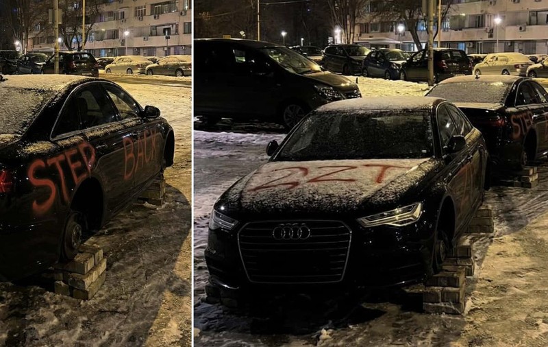 Două Audi A6 abandonate, fără roți, fără numere și acoperite cu mesaje graffiti au stârnit panică într-un cartier din Belgrad