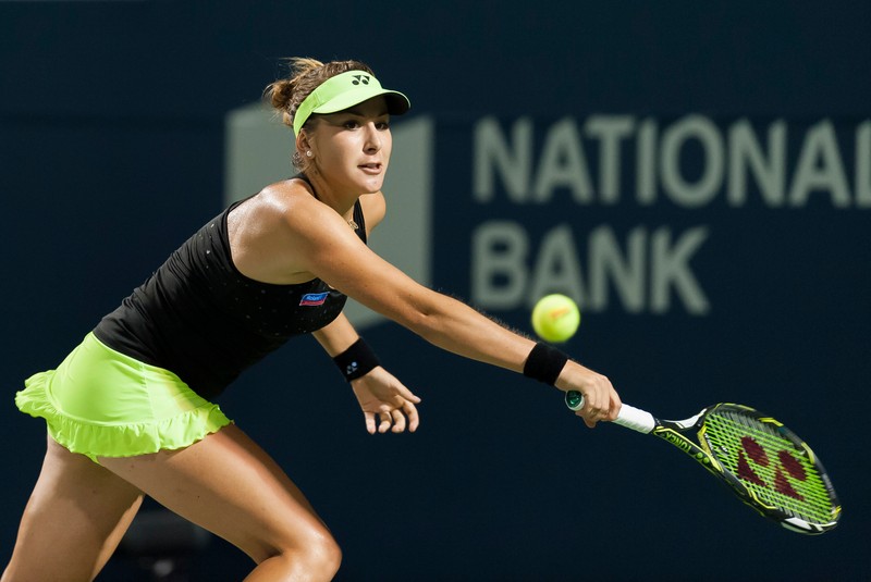 epa04884356 Belinda Bencic of Switzerland in action against Ana Ivanovic of Serbia in their quarterfinal match at the Rogers Cup women's tennis tournament in Toronto, Canada, 14 August 2015. EPA/WARREN TODA