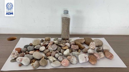 Pietricele subtilizate de cetățeanul de origine română.