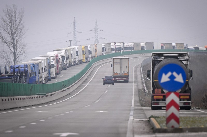 Trucks queue to enter to the Giurgiu-Ruse border point between Romania and Bulgaria, near Giurgiu, Romania on December 6, 2022. For more than ten years, Romania and Bulgaria have been waiting at the gates of the Schengen area. A few hours before a vote in Brussels, no one seems to believe it anymore in these two countries tempted by euroscepticism.,Image: 743117735, License: Rights-managed, Restrictions: TO GO WITH AFP STORY BY Herve BOSSY and Vessela SERGUEVA, Model Release: no