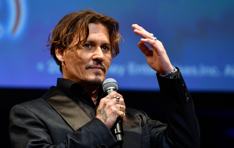 Johnny Depp a ajuns la o înţelegere cu foştii săi manageri pe care îi acuza de fraudă
